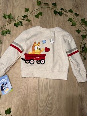 Bluey Kids Cream Sweatshirt with Red Wagon Graphic